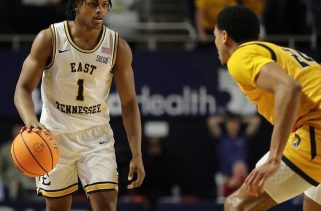 Brya and Johnson Claim Victories As Huskies Fall to Purdue