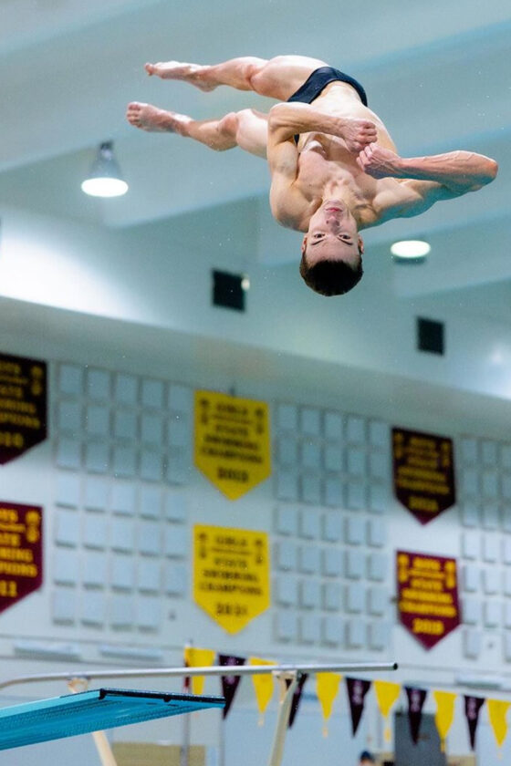 Minot High girls gymnastics host 'Boys in Blue' home tournament