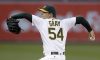 A's beat Brewers 3