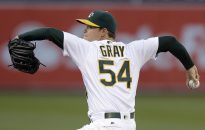 A's beat Brewers 3
