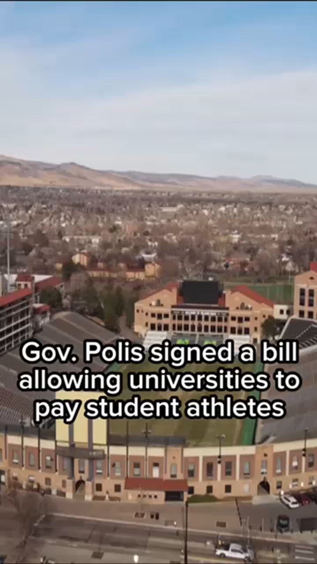 Colorado governor signs bill letting universities pay student athletes