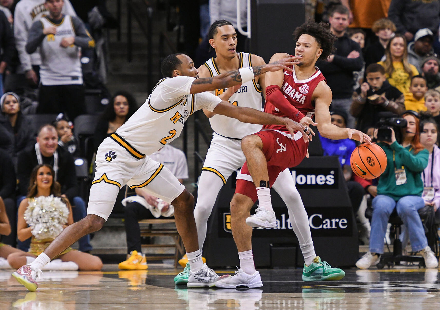College sports lurches forward, hoping to find a level playing field with fewer lawsuits