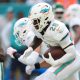 Miami Dolphins rookies team up with Special Olympics athletes with heartwarming football game