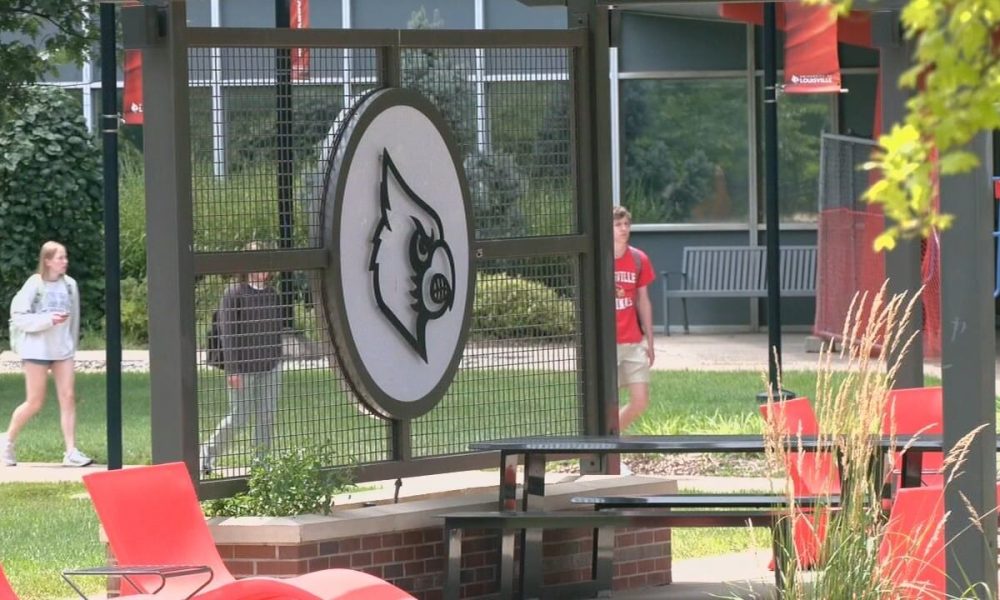 How is University of Louisville dividing its revenue