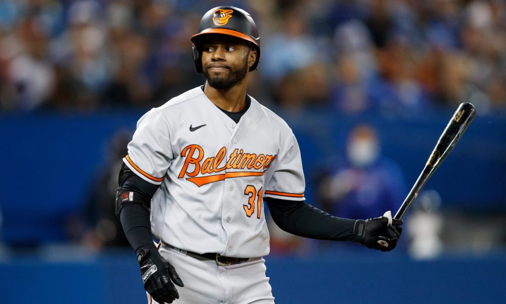 Mullins traded to Mets for three minor leaguers