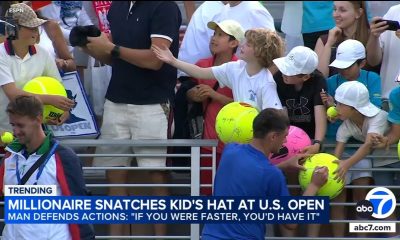 Millionaire CEO who snatched hat from boy at tennis match says he made a 'huge mistake'